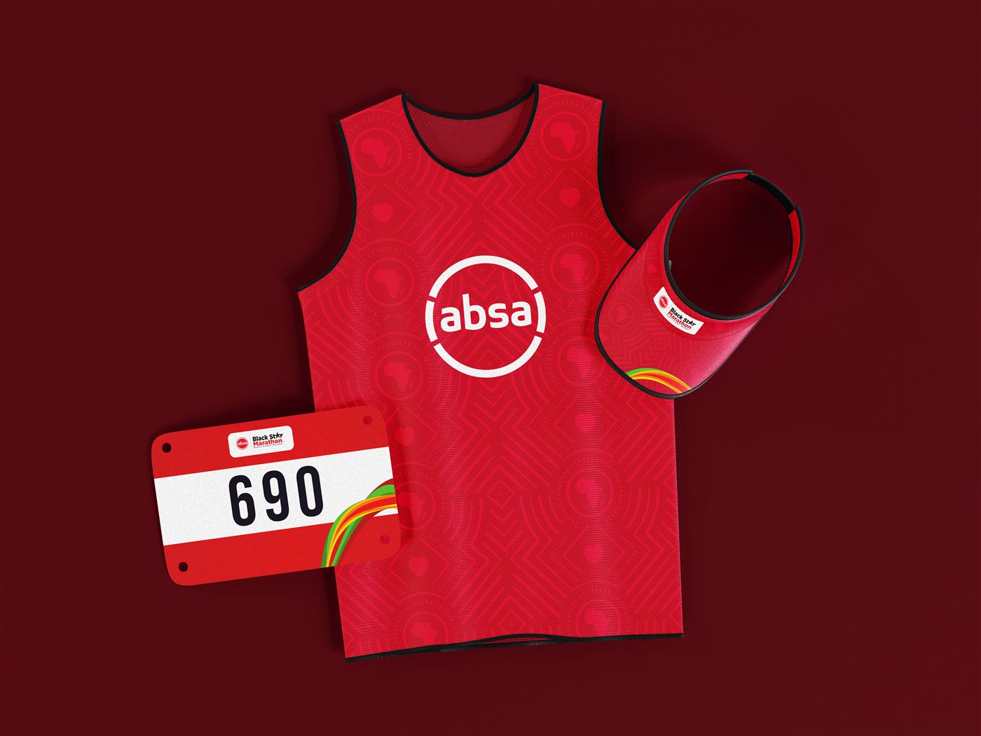 Absa Black Star Marathon key visual: a runner celebrating at the finish line.