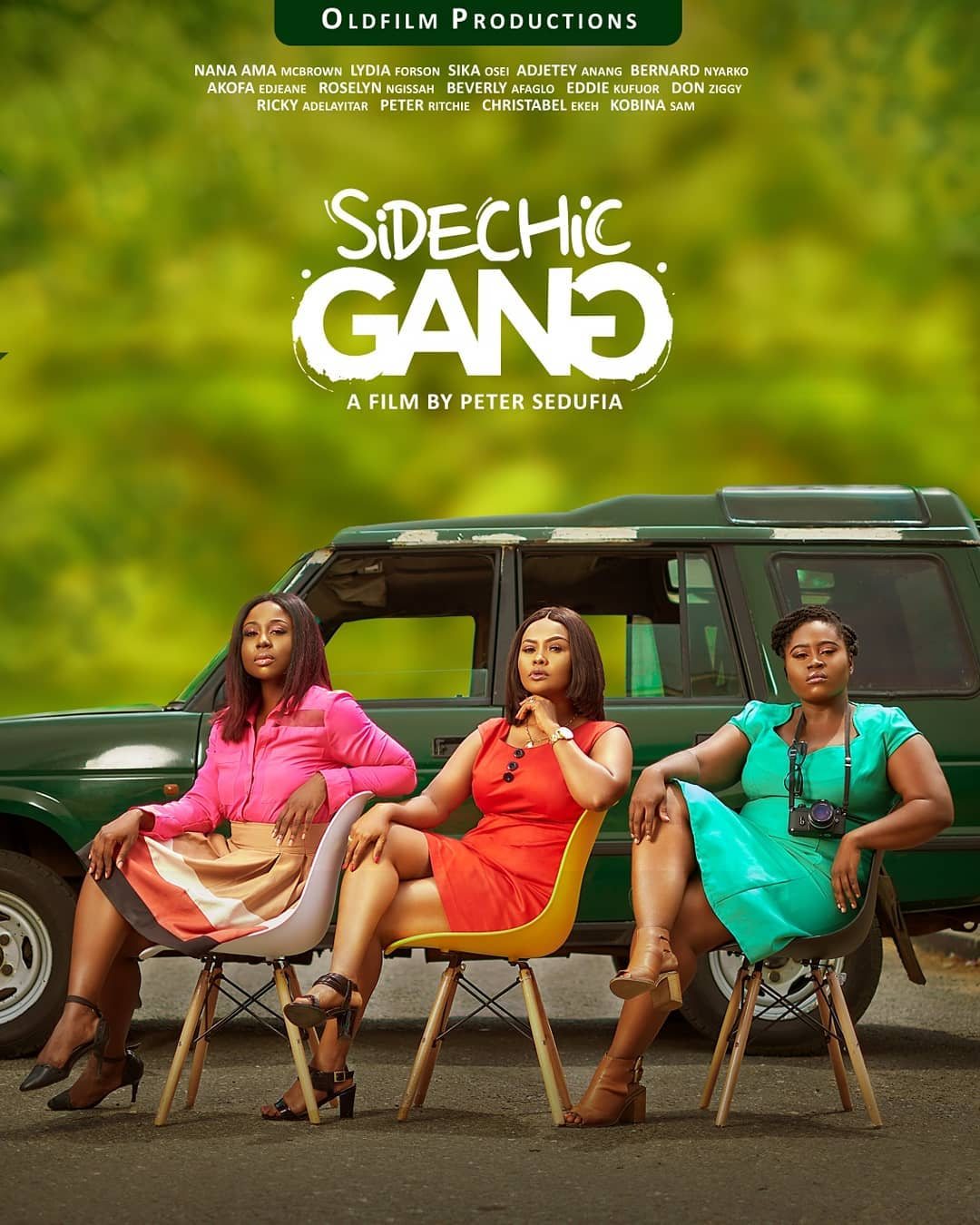 Sidechic Gang, the three leads seated beside the truck.